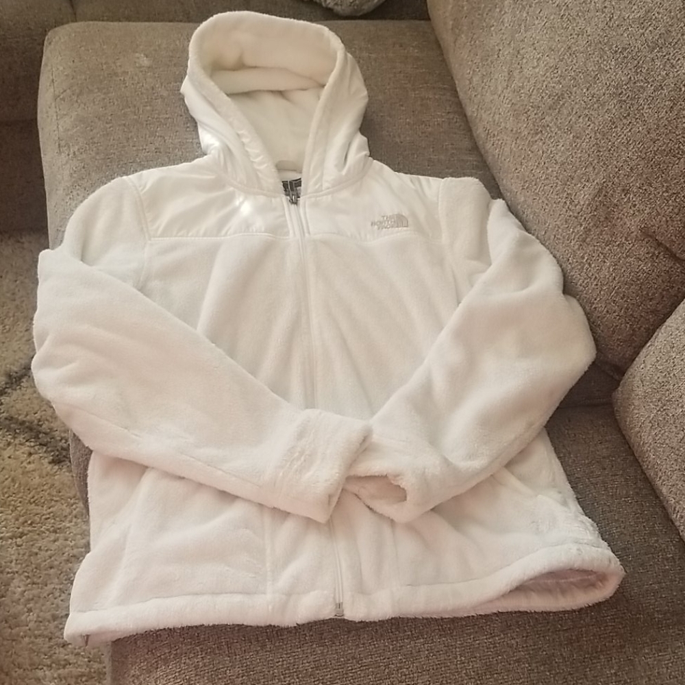 White fuzzy North Face zip up coat